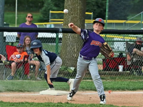 a baseball player throwing a ball