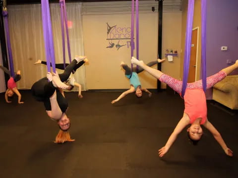 a group of people doing yoga