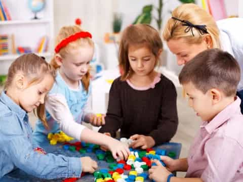 a group of children playing with toys