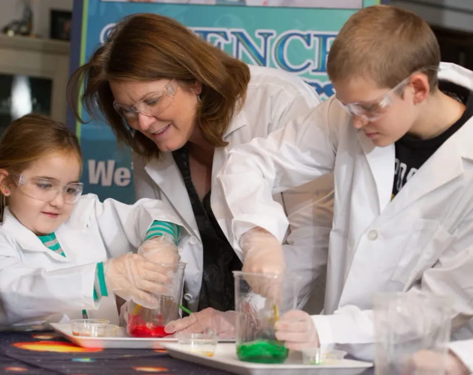 a group of people in lab coats