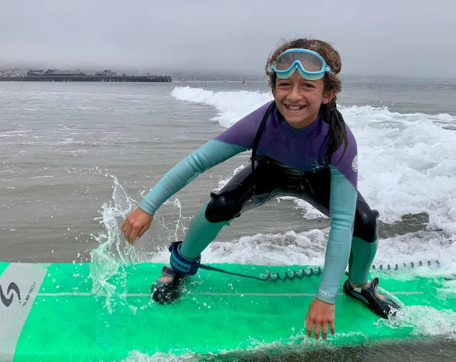 a girl on a surfboard