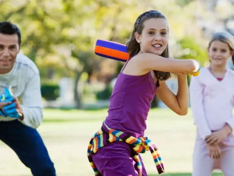 a girl throwing a frisbee