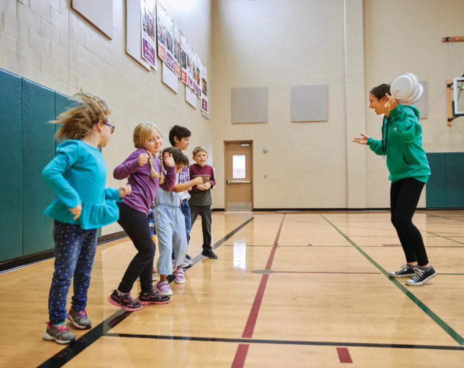 a group of children in a gym