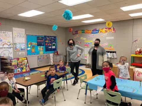 a group of people in a classroom