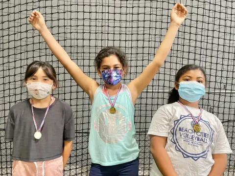 a group of kids with face masks