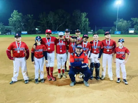 a group of baseball players posing for a photo