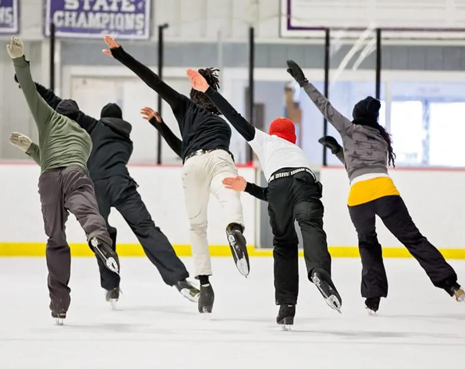 a group of people ice skating