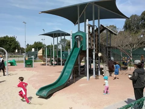 a group of people at a playground