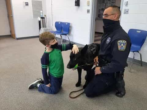 a person and a boy with a dog