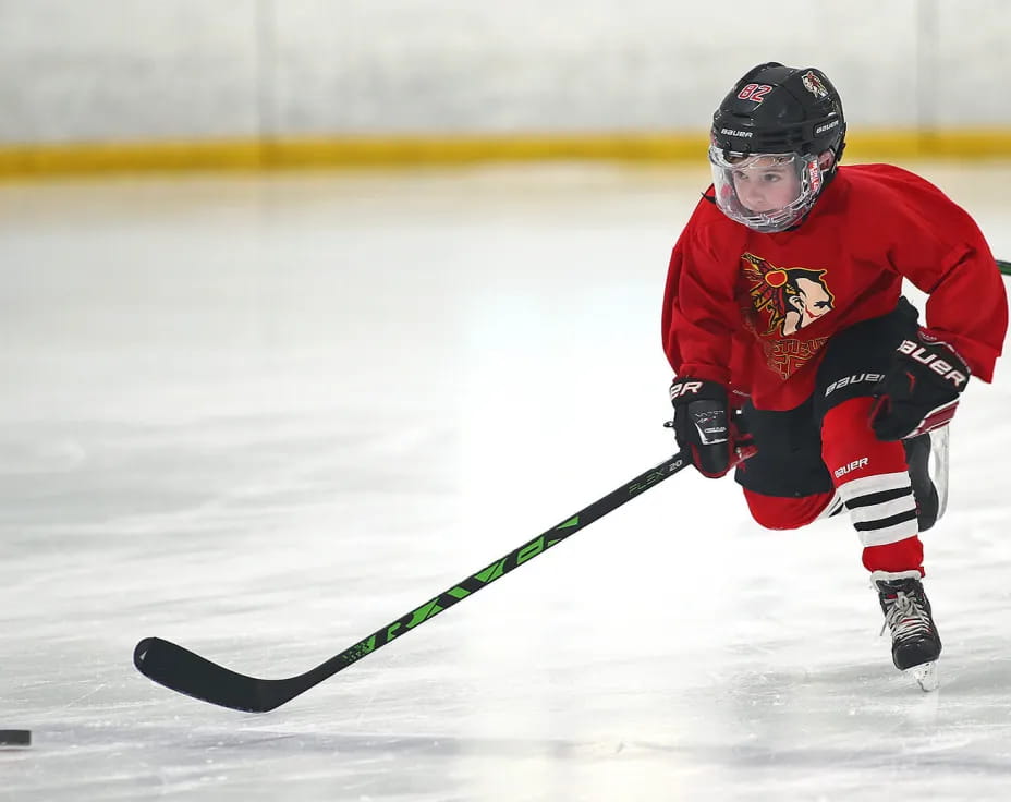 a man playing hockey