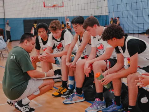 a group of people sitting on the floor