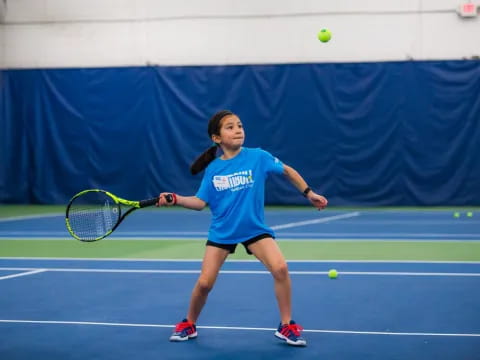 a woman playing tennis