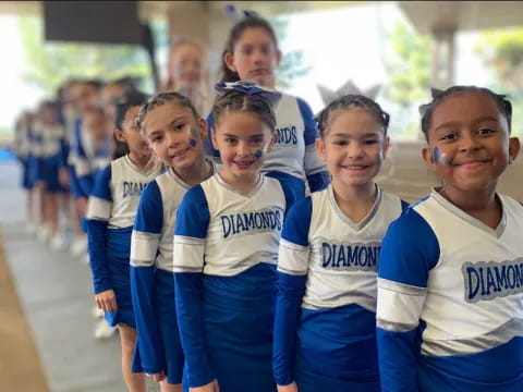 a group of girls in matching uniforms