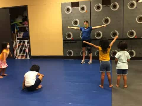 a group of people lifting weights