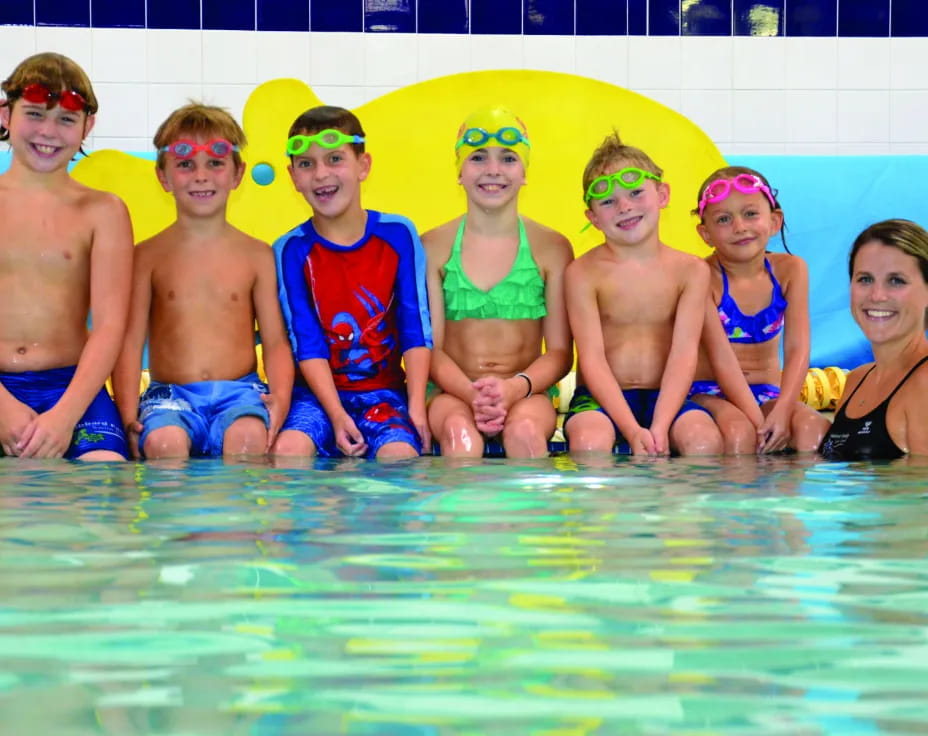 a group of people in a pool