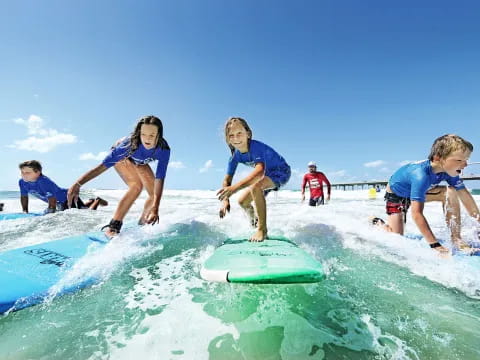 a group of people surfing