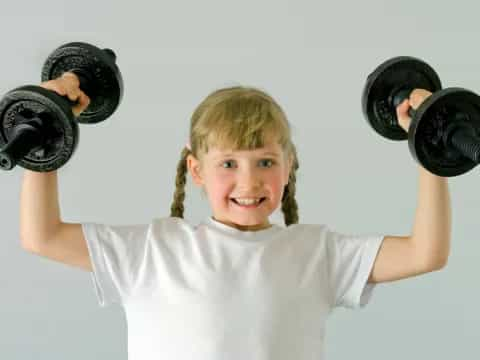 a girl lifting weights