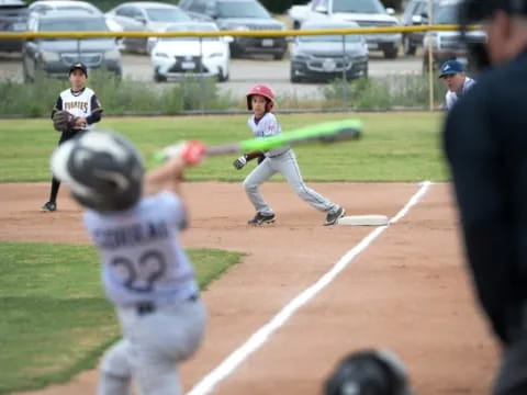 a baseball player swinging a bat