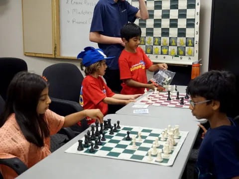 a group of people playing chess