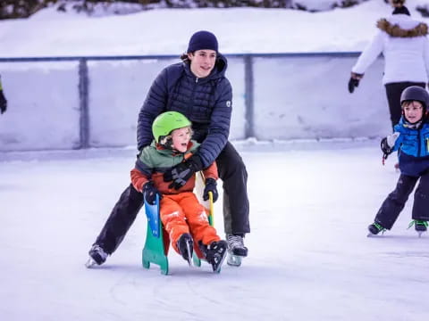 a person and two children on ice