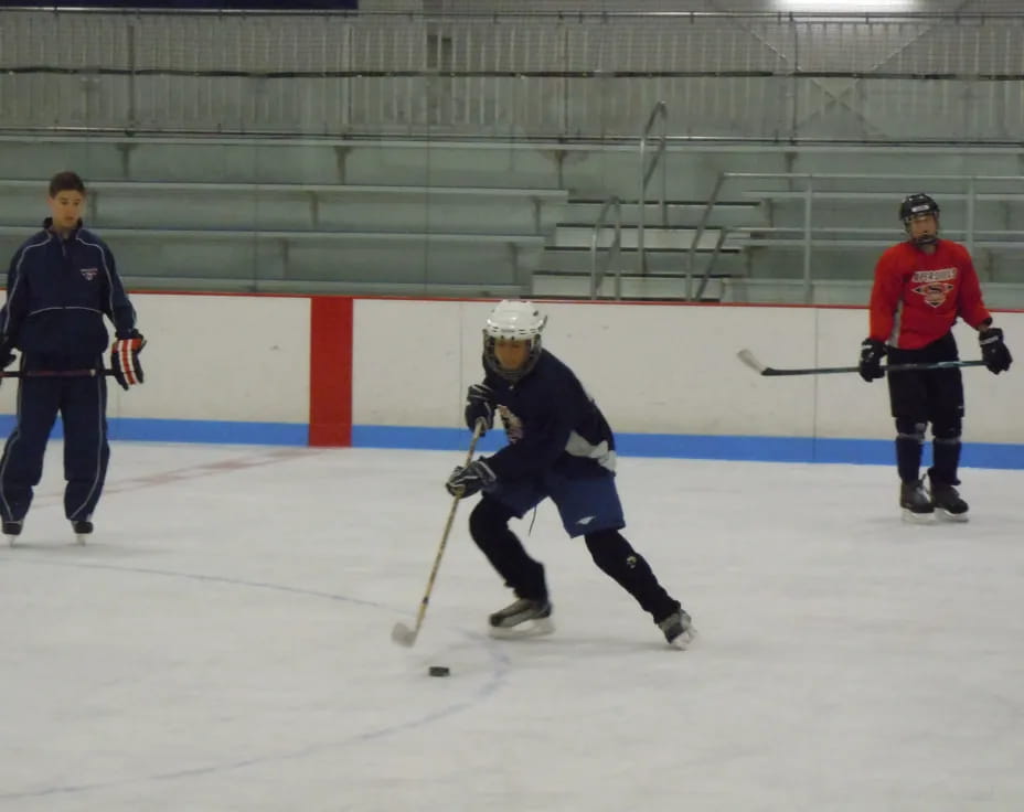 a hockey player in a blue uniform