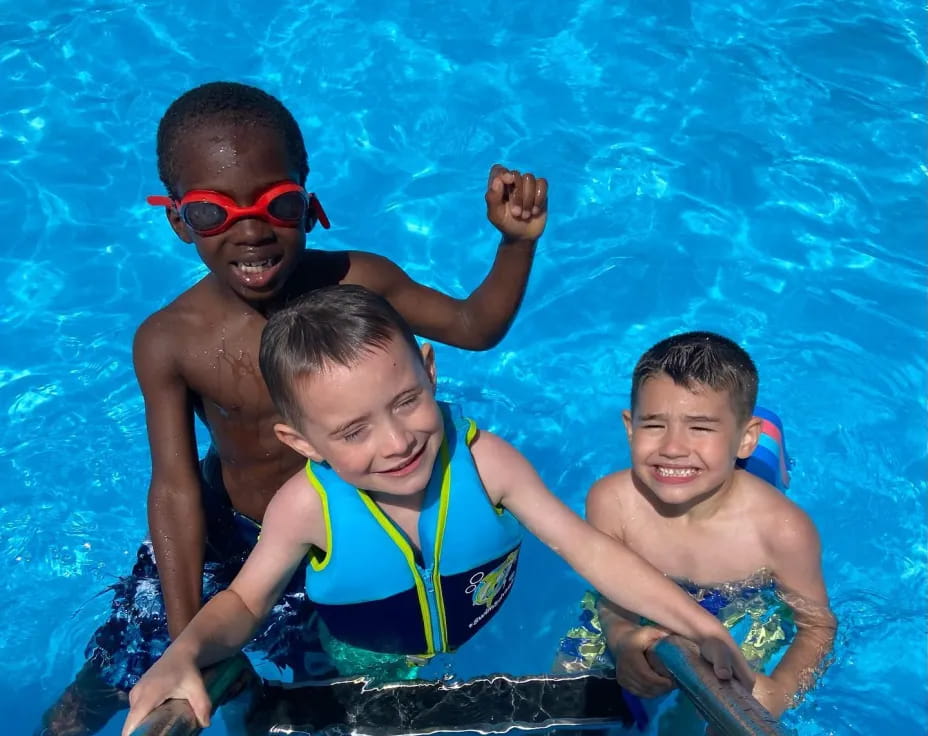 a group of boys in a pool