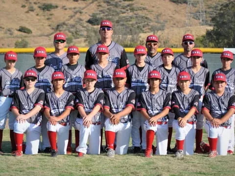 a group of baseball players posing for a photo