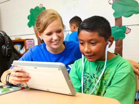 a few young children in a classroom