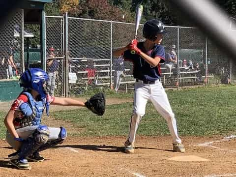 a baseball player up to bat at a baseball game