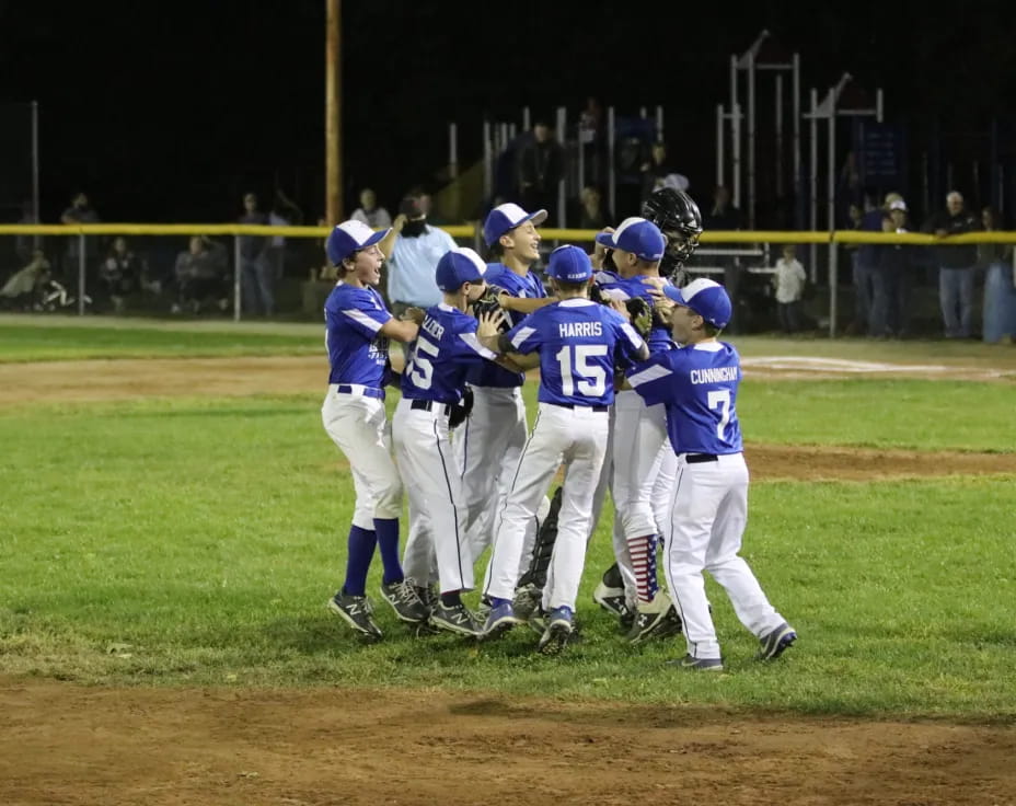 a group of people huddled together