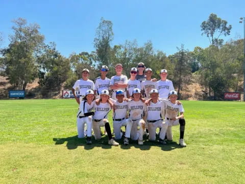 a group of people wearing white uniforms