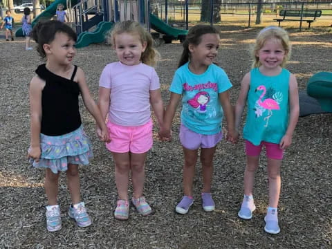 a group of girls posing for a picture