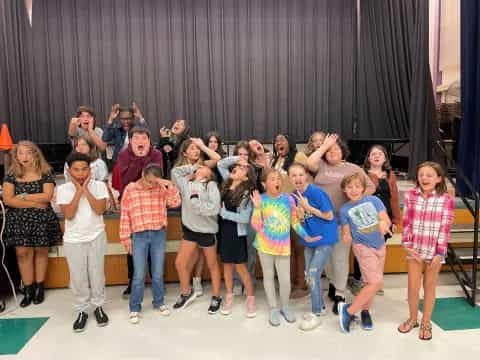 a group of people posing for a photo