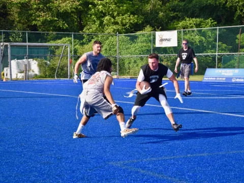 a group of people playing a sport