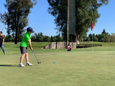 a person playing golf