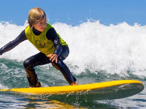 a man surfing on the waves