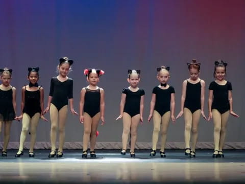 a group of women on a stage