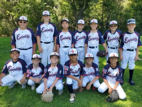 a group of people wearing baseball uniforms