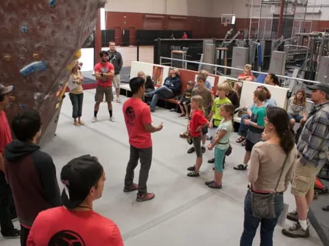 a group of people standing in a room