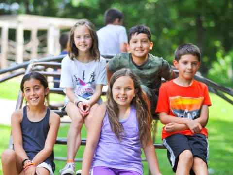 a group of people posing for a photo