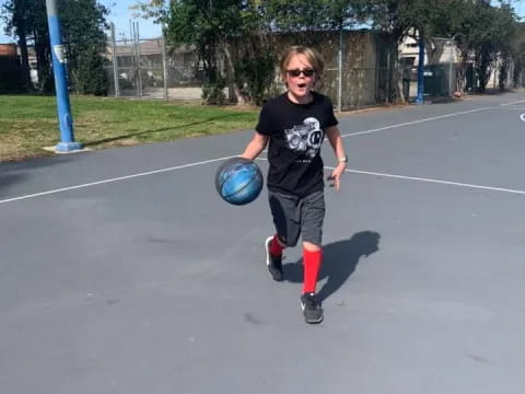 a person holding a football ball