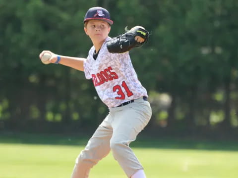 a baseball player throwing a ball