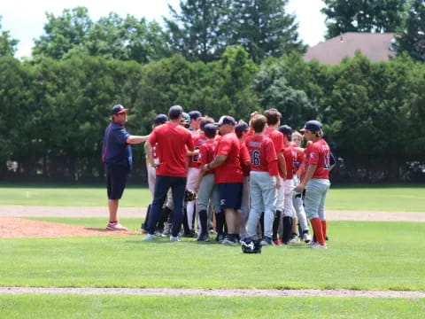 a group of people standing on a field