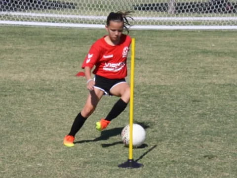 a girl playing football