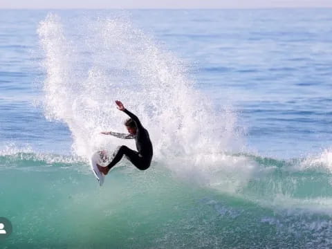 a surfer riding a wave