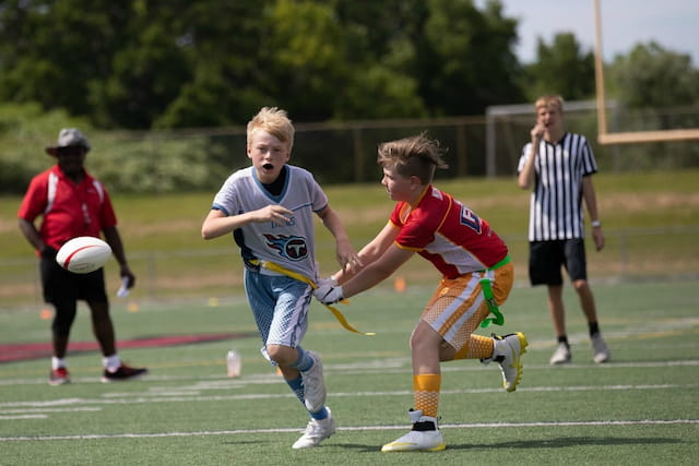 a group of kids playing a sport