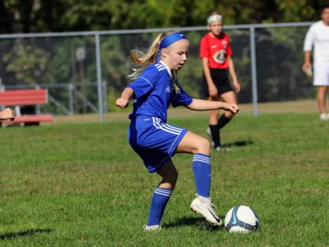 a girl playing football