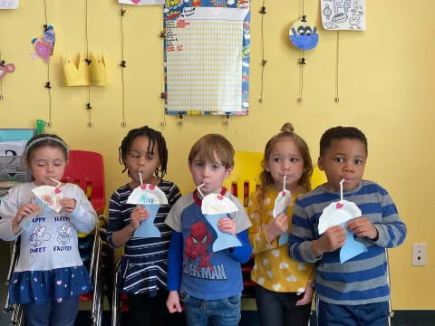 a group of children posing for a photo