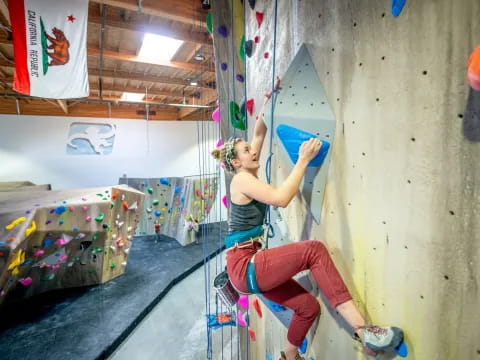 a person climbing a wall