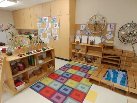 a room with a table and shelves